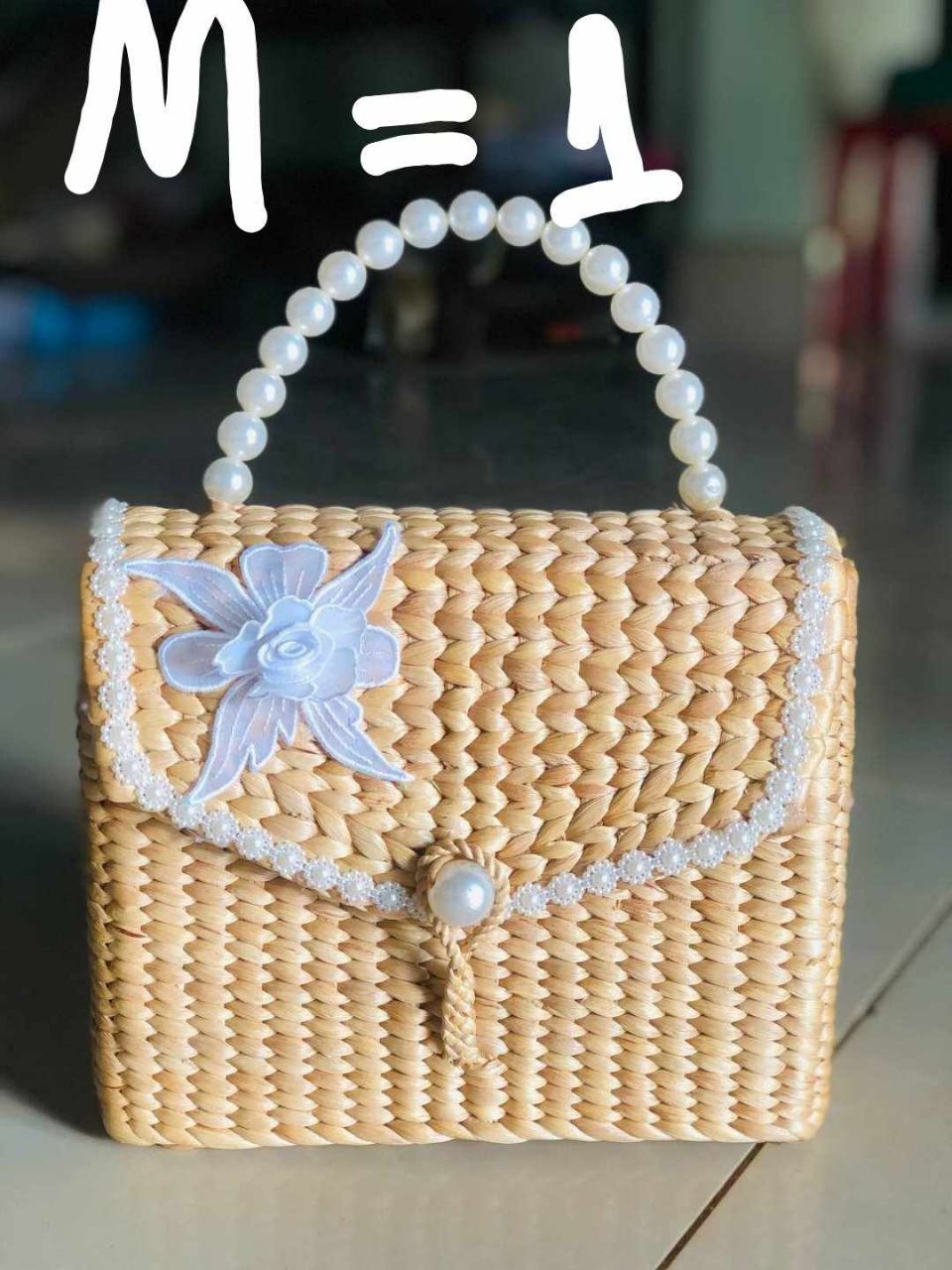 កាបូបកំប្លោកយួរដៃ